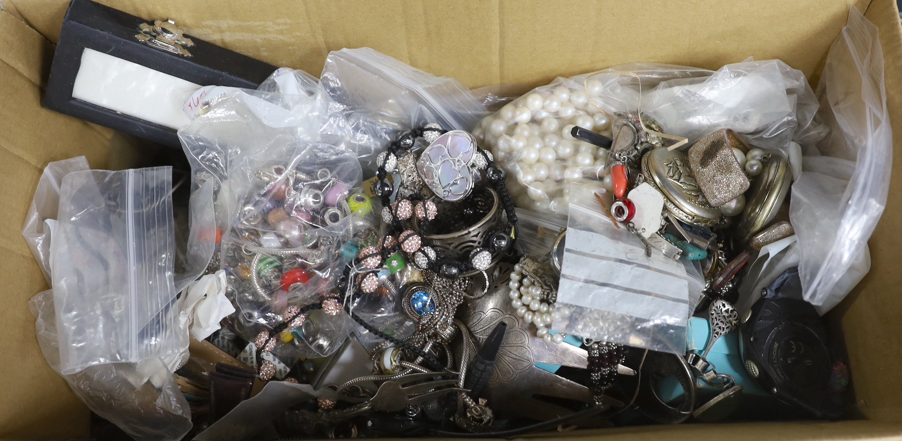 A large quantity of assorted collectables including silver, costume jewellery, watch movements etc.